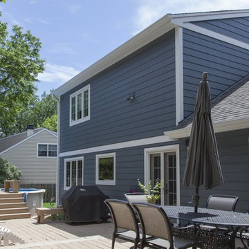 Shiny new Andersen Windows, Evening Blue James Hardie siding & stone accents