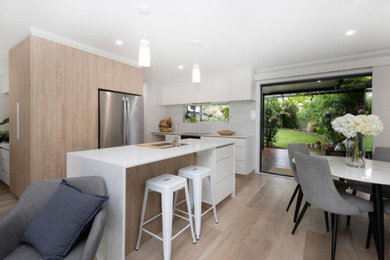 Photo of a transitional home design in Canberra - Queanbeyan.