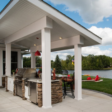Luxurious White Outdoor Kitchen - Accented by Stone