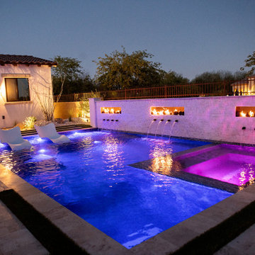 Swimming pool, Water/fire feature wall. landscape lighting