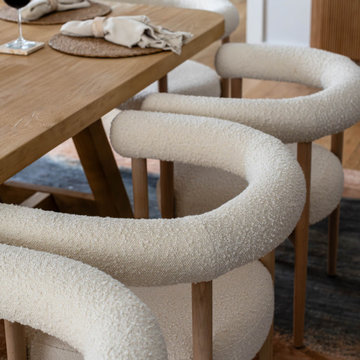 Bouclé Dining Chairs & Oak Table Close-Up