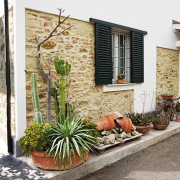 Fusione e Ristrutturazione - Una casa a Vada (LI)