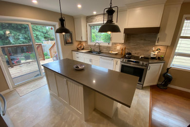 Eat-in kitchen - mid-sized traditional galley vinyl floor and beige floor eat-in kitchen idea in Other with an undermount sink, beaded inset cabinets, white cabinets, quartz countertops, brown backsplash, stone tile backsplash, stainless steel appliances, an island and brown countertops