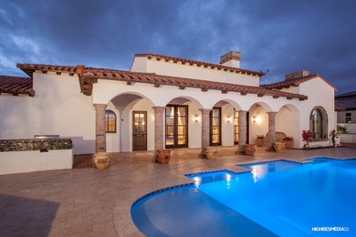 Inspiration for a rustic pool remodel in Phoenix