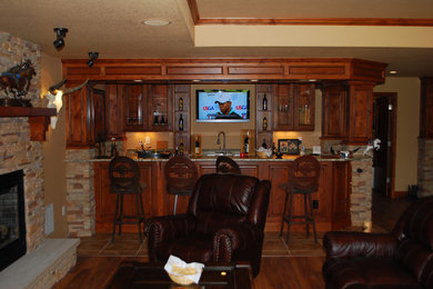 Example of a mid-sized classic home bar design in Denver