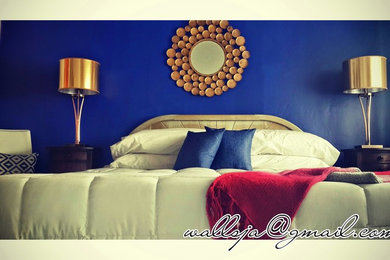 Example of an eclectic master bedroom design in Other with blue walls