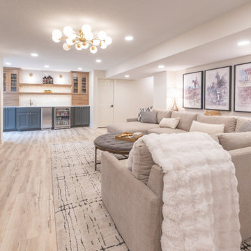 Warm & Inviting Basement Retreat with Custom Bar + Entertainment Center