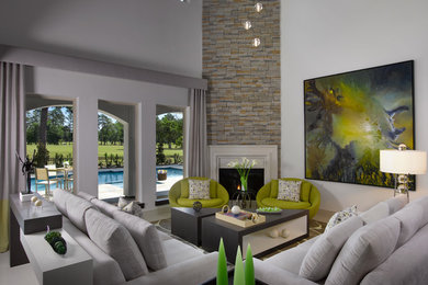 Inspiration for a large transitional formal and open concept porcelain tile living room remodel in Houston with gray walls, a corner fireplace and a stone fireplace