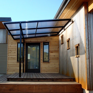 Crimson Bluffs Home- Custom Designed & Fabricated Awnings and Railing