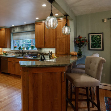 Warm Wood Kitchen Remodel | Natural Cherry Cabinetry, Granite Surfaces