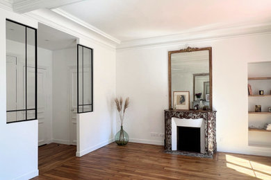 Idée de décoration pour un salon tradition haussmannien.