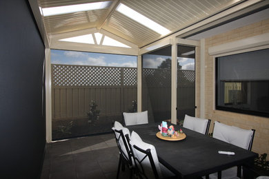 This is an example of a modern courtyard patio in Perth.