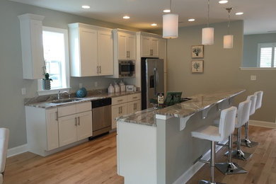 This is an example of a mid-sized transitional kitchen in Other.