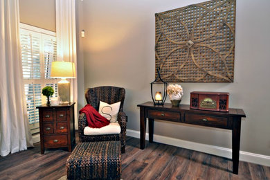 Living room - rustic laminate floor living room idea in Atlanta with beige walls