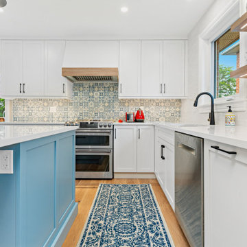 Serene Blue Oasis: Kitchen Renovation with White Perimeter and Meditation-Inspir