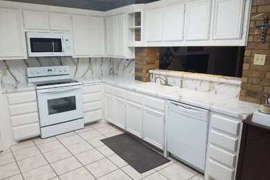 Kitchen - contemporary kitchen idea in Other