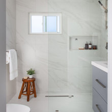 white and warm wood bathrooms