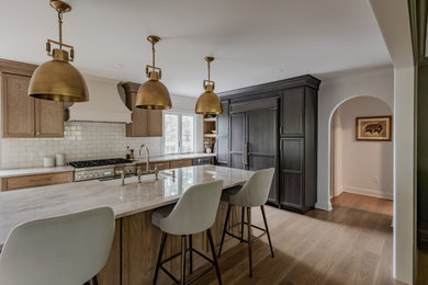 Example of a transitional kitchen design in New York