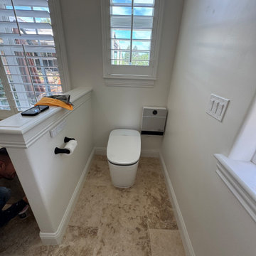 Curd-less walk-in shower; heated floors in bathroom + shower+bench LED