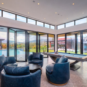 A loaded entertaining space that opens with NanaWall doors to the indoor outdoor