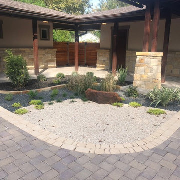 Xeriscape entryway using a combination of aggregates and mulch
