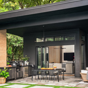 A versatile poolside cabana that combines both indoor and outdoor functionality.