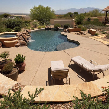 Landscape surrounding swimming pools in the desert southwest