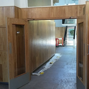 Installing Wall Cladding and Concrete Floor Tiles in Hide Tower