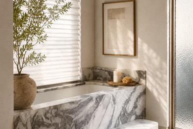 Trendy stone slab single-sink bathroom photo in Austin with granite countertops and a floating vanity