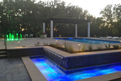 Pool - mid-sized contemporary backyard rectangular lap pool idea in Dallas