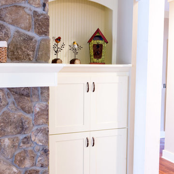 Fireplace flanked with Bookshelves