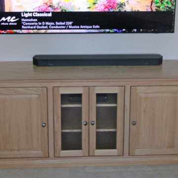 Custom Traditional TV Console with Wood and Glass Doors