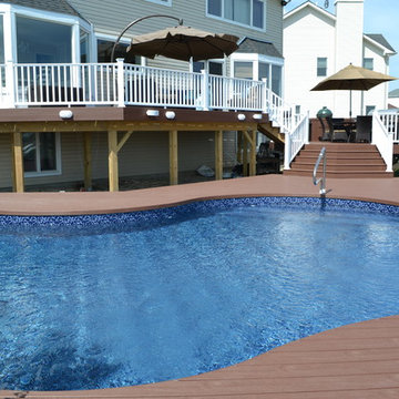 : Elegant Multi-Level Deck and Freeform Pool: In order to bring the outdoor spa