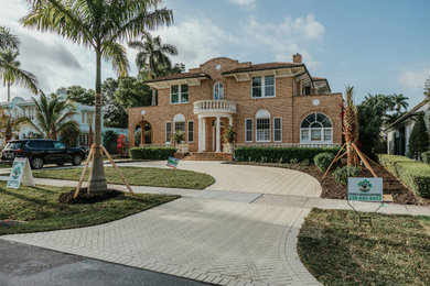 Inspiration for a mid-sized traditional full sun front yard formal garden in Other for winter.