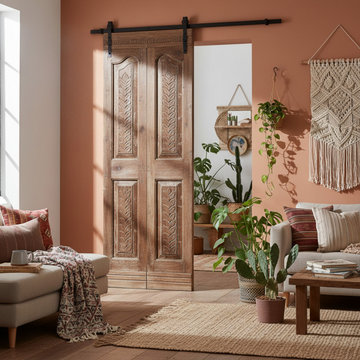 Storybook Spanish Revival Features Floral Motifs and Whimsical Carved Doors