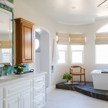 White & Bright Master Bathroom w/ Teal mosaic tile backsplash & Freestanding tub