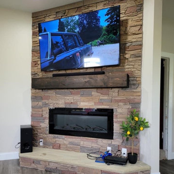 Stratford Stacked Stone Electric Fireplace and TV Wall