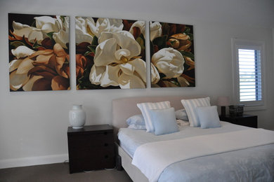 This is an example of a large contemporary bedroom in Sydney.