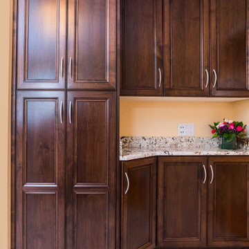 Transitional Style Laundry/Mudroom With Medium Stained Maple Cabinets