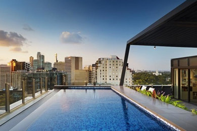 This is an example of a mid-sized modern rooftop rectangular lap pool in Melbourne.