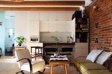 Example of a small urban open concept living room design in Other