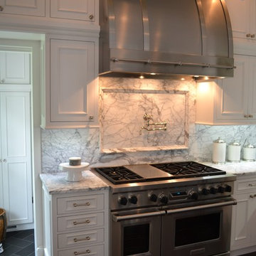 Traditional White Kitchen with Stainless Range and Hood