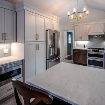 Two Tone Kitchen with Wood Stained and Light Beige Cabinets