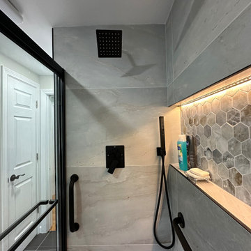 Modern Walk-In Shower Remodel with LED Niche and Custom Tile Design