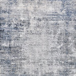 Exquisite Rugs - Intrigue Power Loomed Polyester and Acrylic Gray/Navy Blue Area Rug - The Intrigue rug artistically melds contemporary appeal with timeless, intricate beauty. The polyester/acrylic blend lends an incredibly soft dynamic feel and its sleek color tones and unique pattern make this rug the perfect statement in any room.