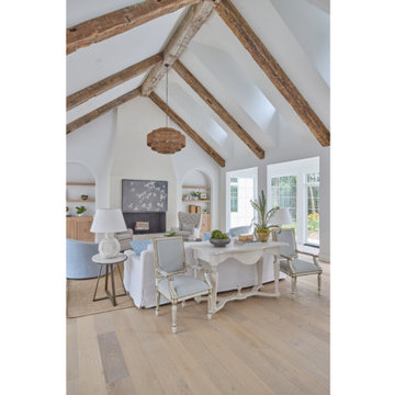 Great Room with Vaulted Ceilings and Architectural Beams