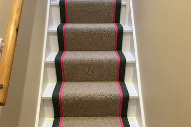 This is an example of a medium sized modern staircase in London.