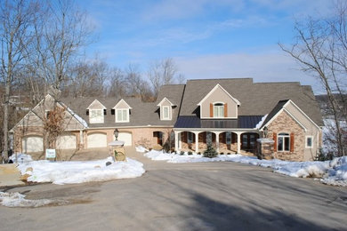 Example of a transitional exterior home design in Cincinnati