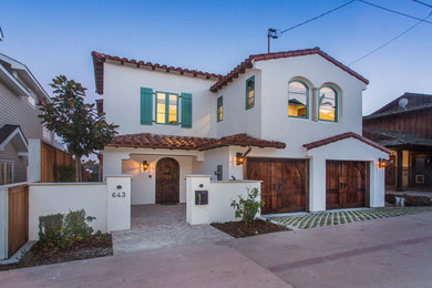 Example of a tuscan exterior home design in San Diego