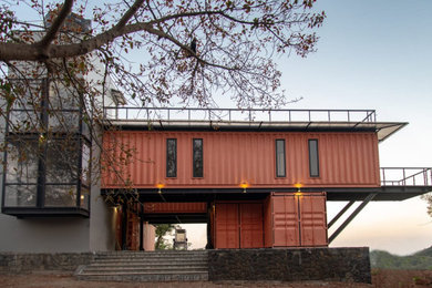 Example of an urban exterior home design in Mumbai